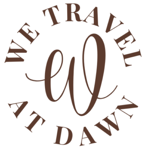 We Travel at Dawn dark logo